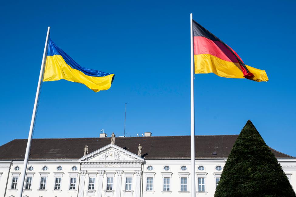 On 24 February 2024, Ukraine's blue and yellow-coloured flag flies in front of Schloss Bellevue